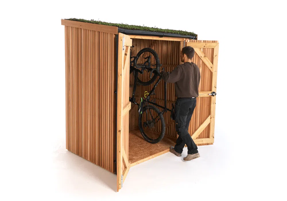 Vertical Bike Shed with bikes hung on the integrated powder-coated hooks, image 9 in the product gallery